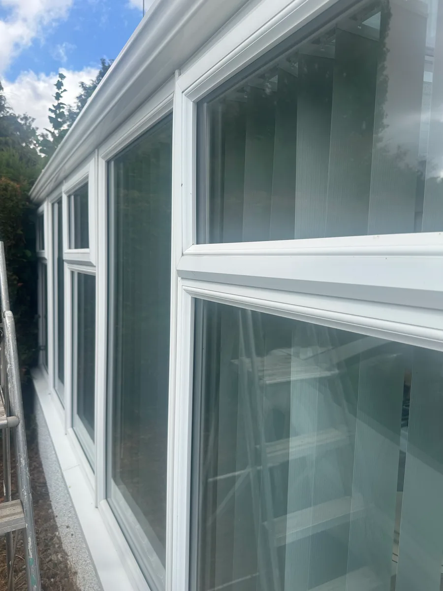 Freshly cleaned conservatory glass and white frames after an exterior conservatory clean